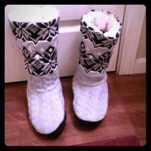 Grey,  white,  and black slipper boots