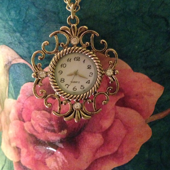 Gold clock necklace