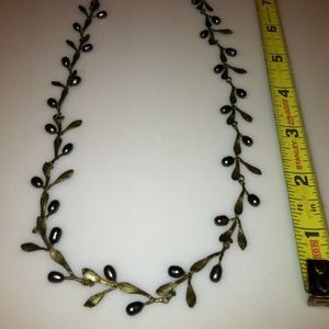 Olive leaf necklace.