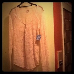 Sheer peach long sleeve top.