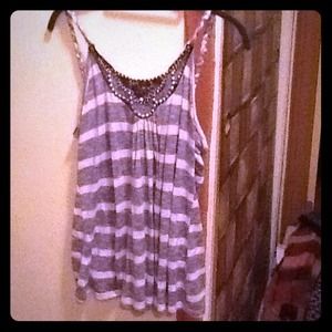 Pale blue and white tank top.