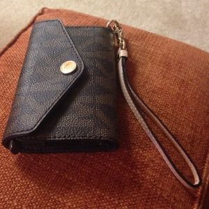 Designer Michael Kors iPhone 4/4S leather case.