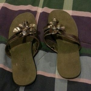 Used Gray shoes with flowers on them