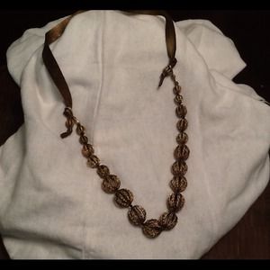 Antiqued gold and leather necklace