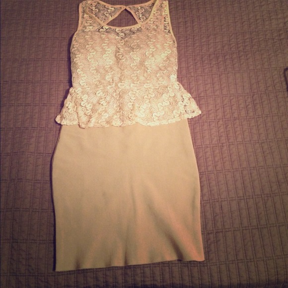 Champagne, form-fitting, sexy, lace peplum dress.