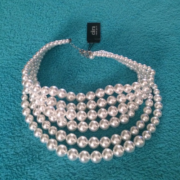 White pearl necklace.
