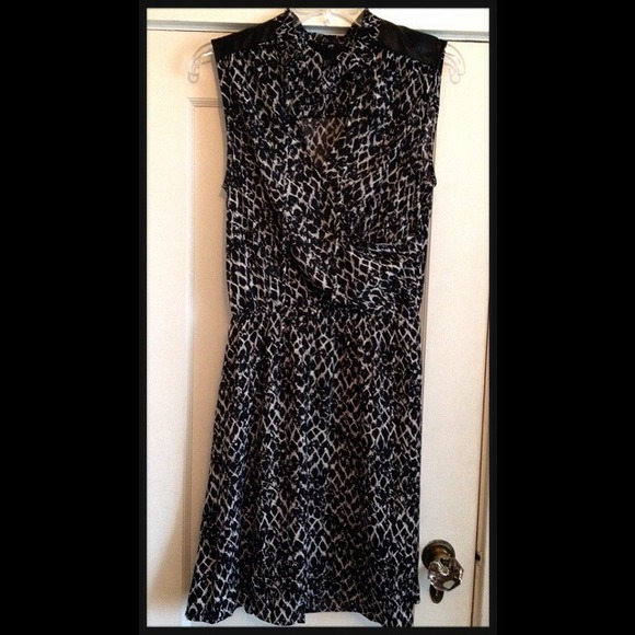 Animal print dress with faux leather detail.