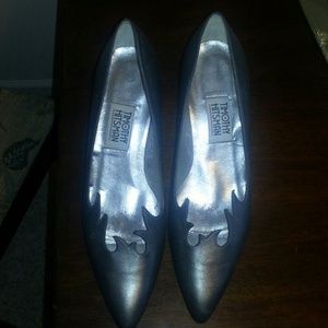 Silver dress shoes.