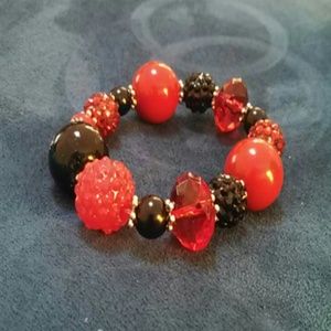 Red and black bracelet.