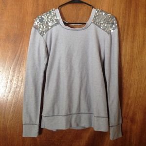 Sweater with open back and sequins