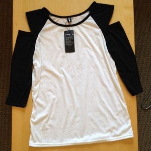 SOLD Cold shoulder black and white top