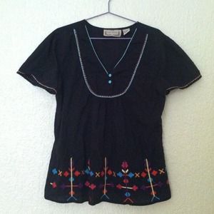 Black blouse with cross-stitch details
