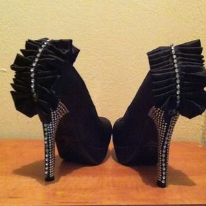 Diamond studded bow heels by Lilianna!