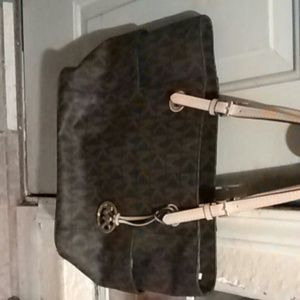 Michael Kors designer handbag with logo charm