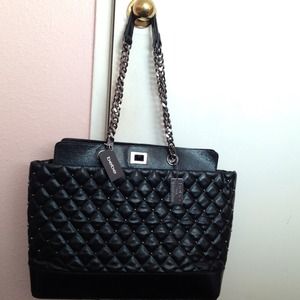 $50 brand new bebe purse.