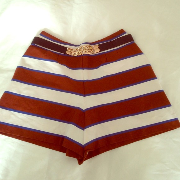 Black waist belt with chain detail.