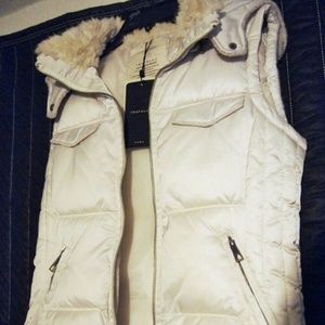 White puffy vest
