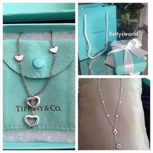 includes dust bag, box, gift bag