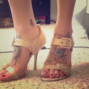 Baker's gold and rhinestone heels