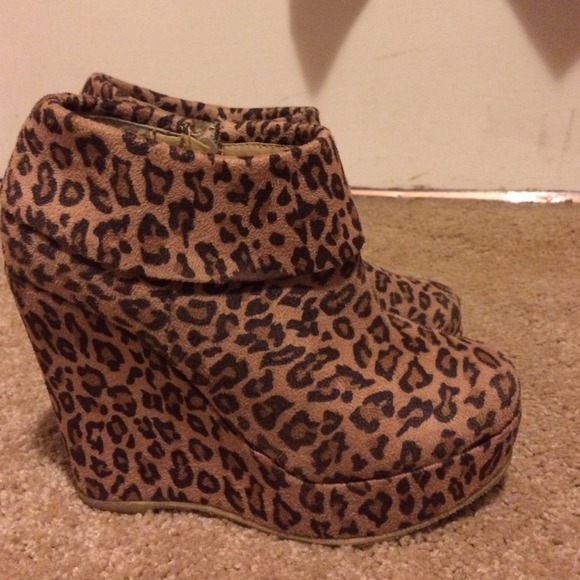 Suede cheetah printed wedge booties