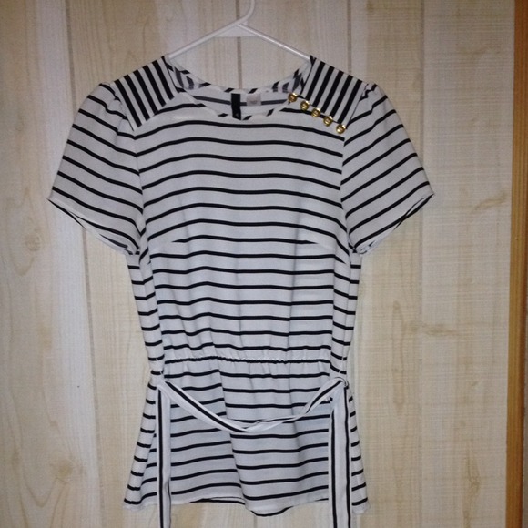 Black and white dressy top with belt or tie
