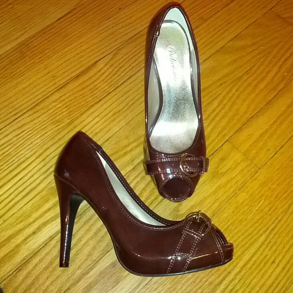 Size 7 Wine colored Patent Leather High Heels.