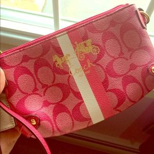 Coach pink wristlet-will negotiate