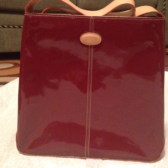 Wine color patent leather bag