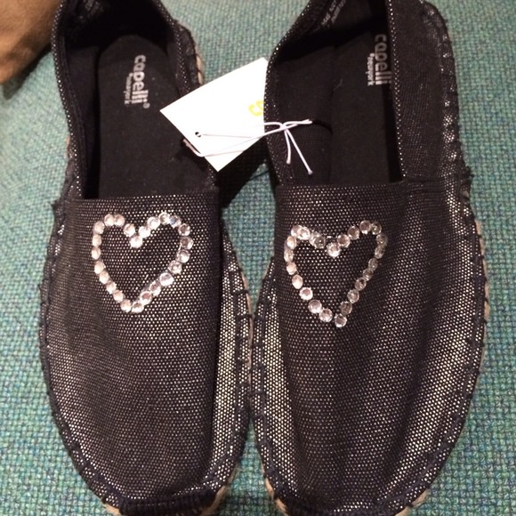 Size 7 NWT canvas flats