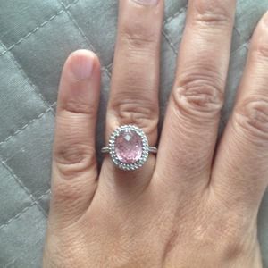 Dimond whit gold ring with Pink CZ stone.