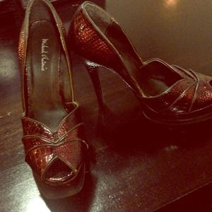 Very high platform bronze heels