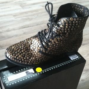 Black and gold boot