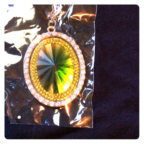 Green medallion with diamond necklace and earrings