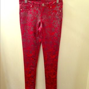 Red skinny snake pants