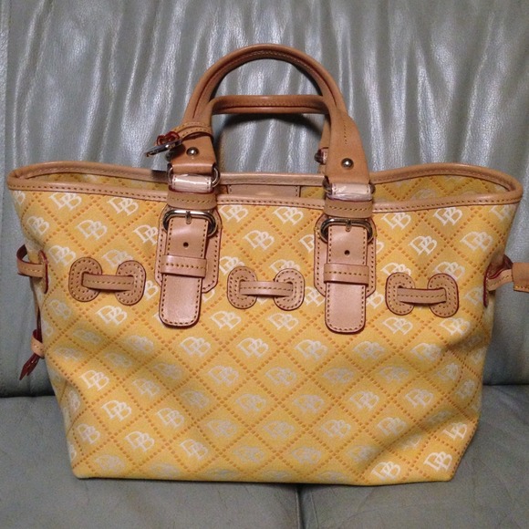 Dooney & Bourke yellow small chiara bag never used