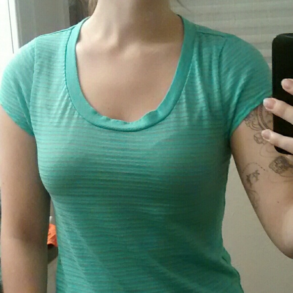 SOLD*** Light Blue T-shirt. Sheer Material.