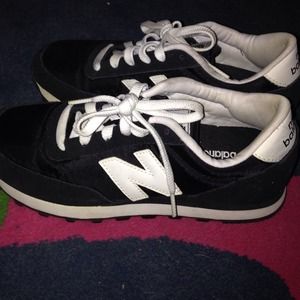 Black  and White New Balances 501s.