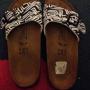 White and black patterned Birkenstocks