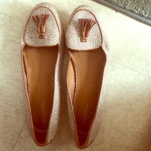 Brown and white polka dot flats