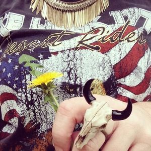 Handmade mini skull ring. Adjustable.