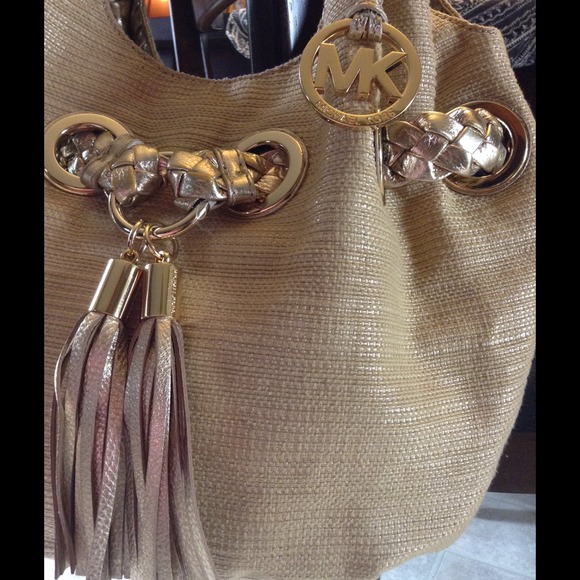 Remarkable Michael Kors handbag with tassel accent