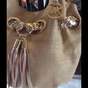 Remarkable Michael Kors handbag with tassel accent