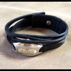 Beautiful and hip, black leather watch.