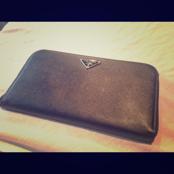 Prada Clutches & Wallets - New  authentic Prada Saffiano zip around wallet