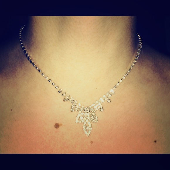 Classy, Silver colored, rhinestone necklace.