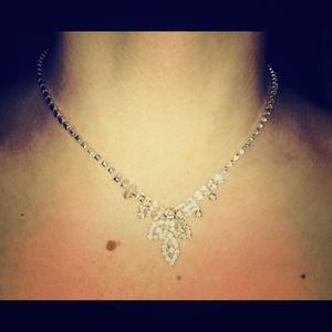 Classy, Silver colored, rhinestone necklace.