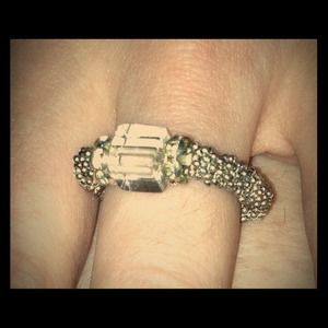 Silver colored beaded ring.