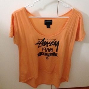 Light orange Stüssy short sleeve;