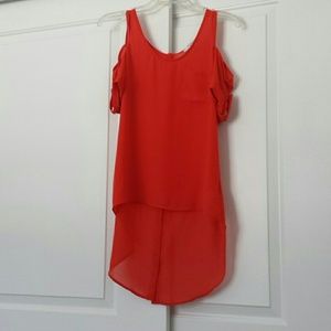 Orange tunic with cut out shoulders