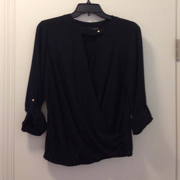 Stylish wrap around look blouse!
